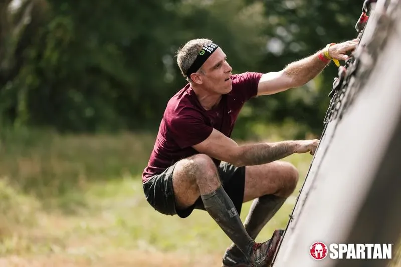 Brian Johnson participating in a Spartan race