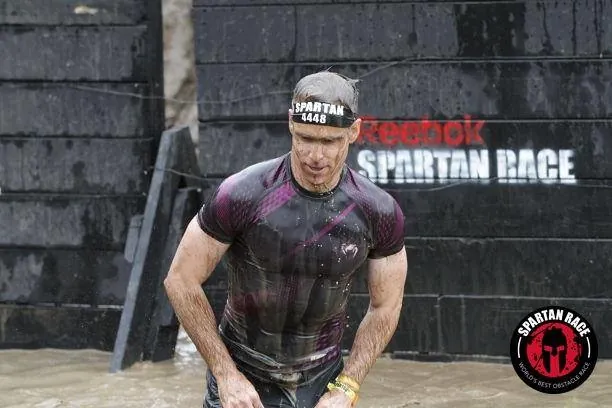Brian Johnson mid-obstacle in an endurance race