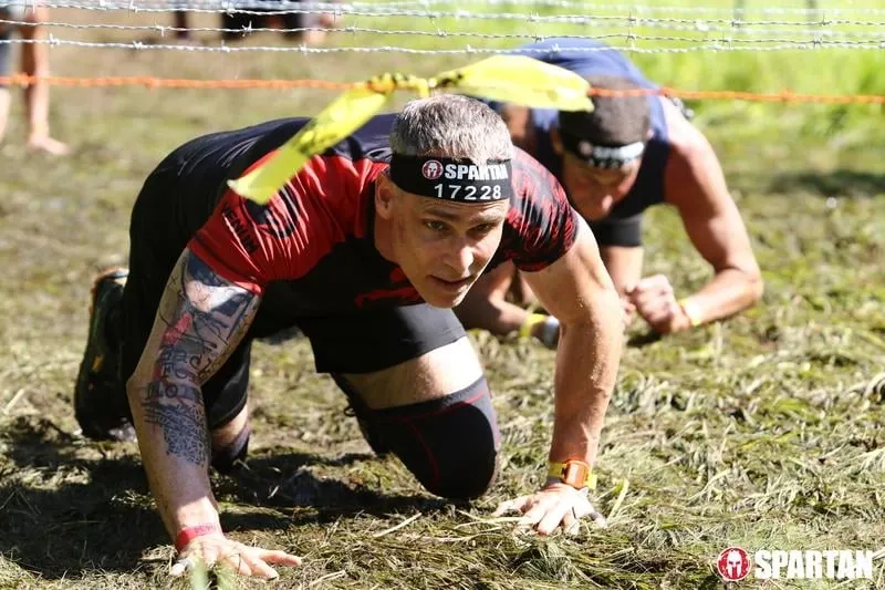 Close-up of Brian Johnson crossing a race finish line